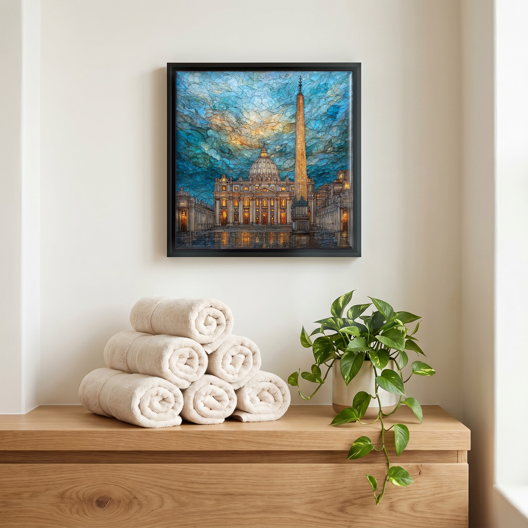 Above the linens, in a slim black surround.