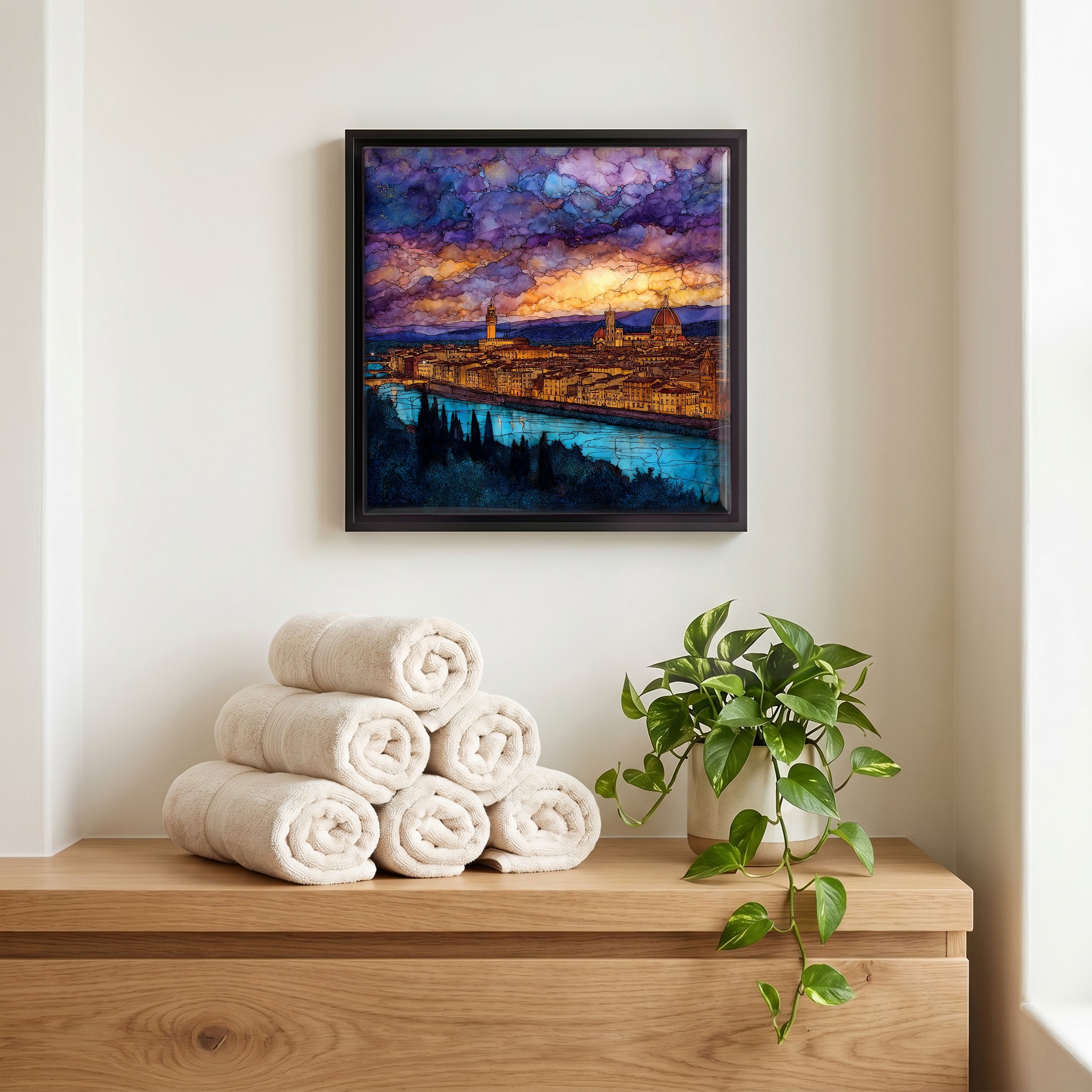 Above the linens, in a slim black surround.