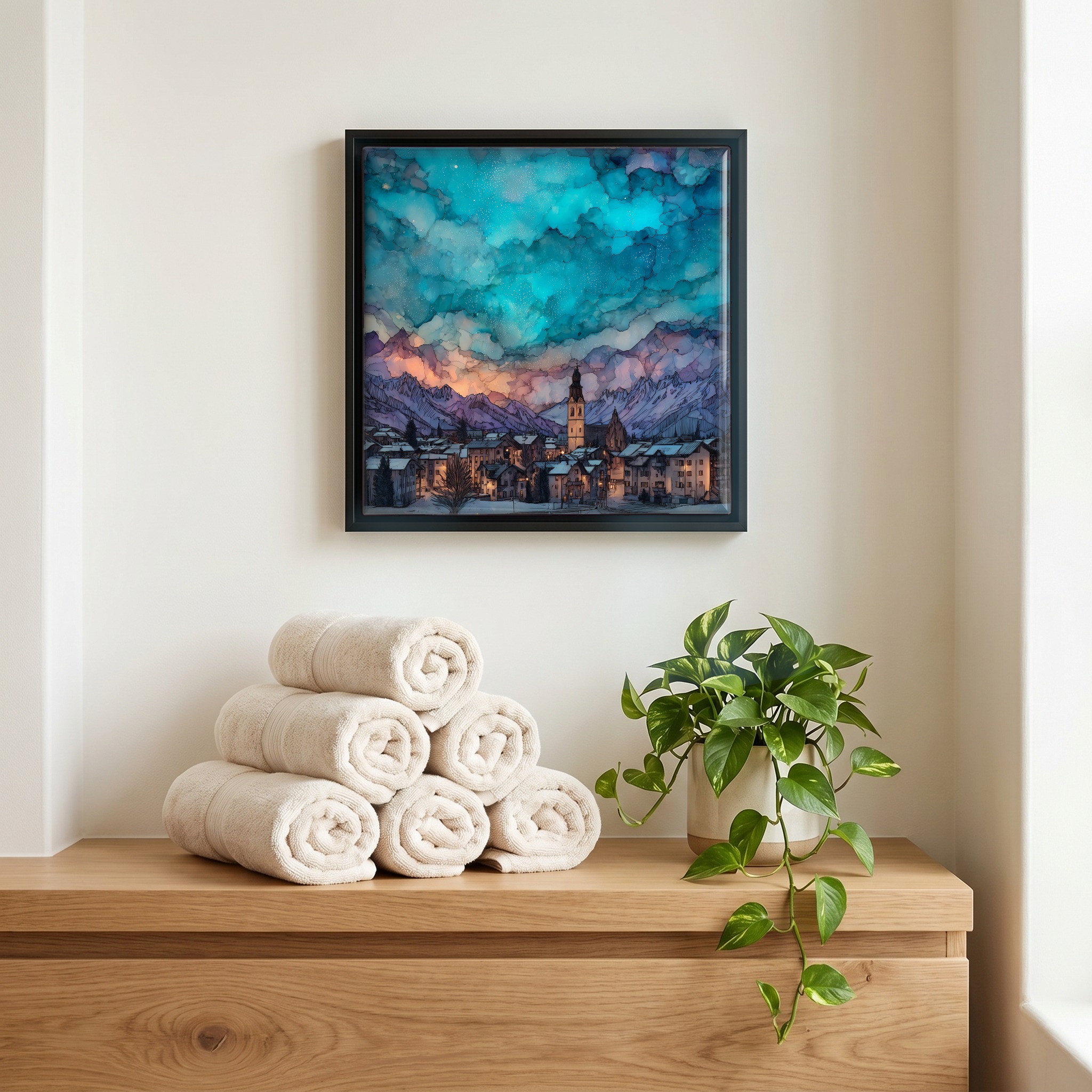 Above the linens, in a slim black surround.