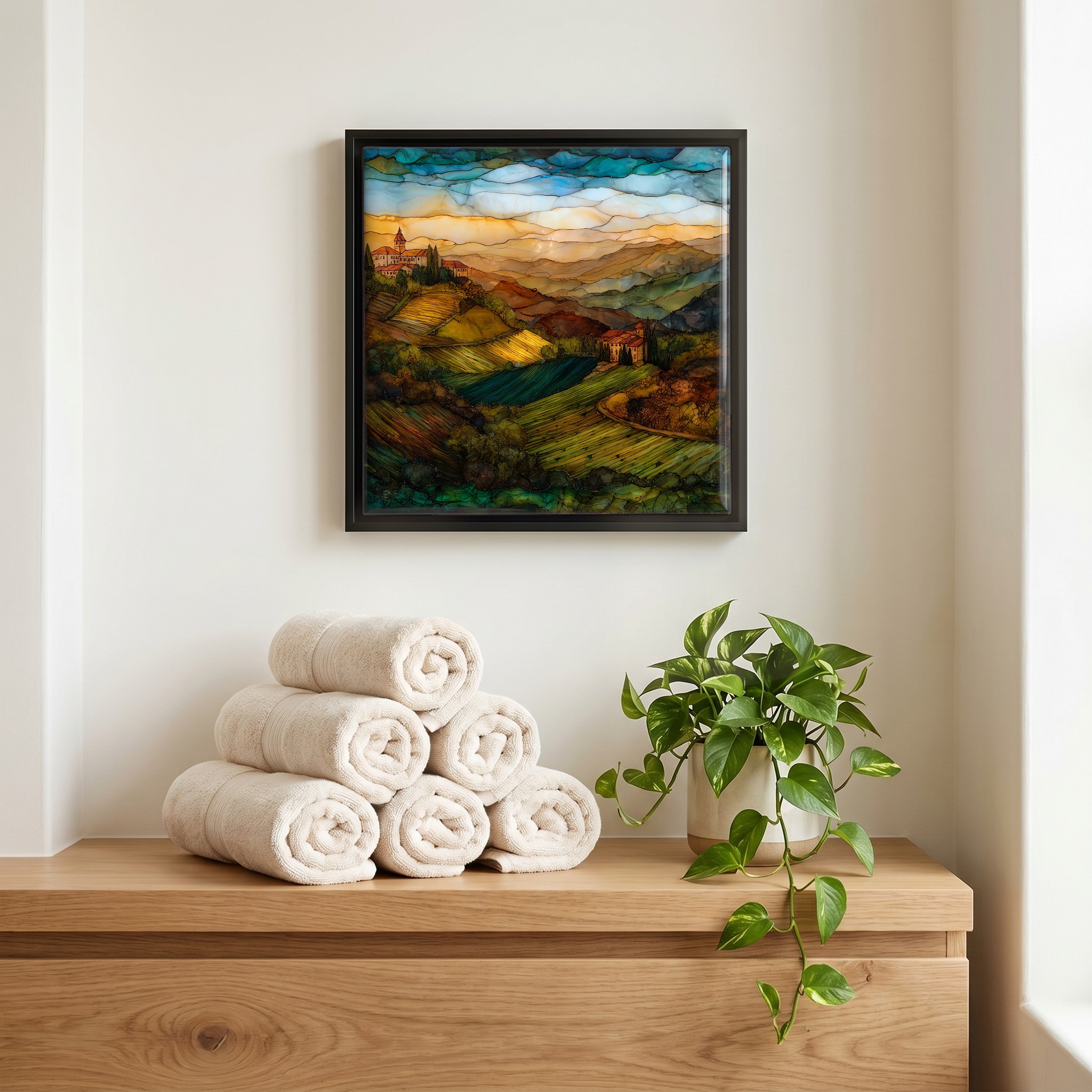 Above the linens, in a slim black surround.