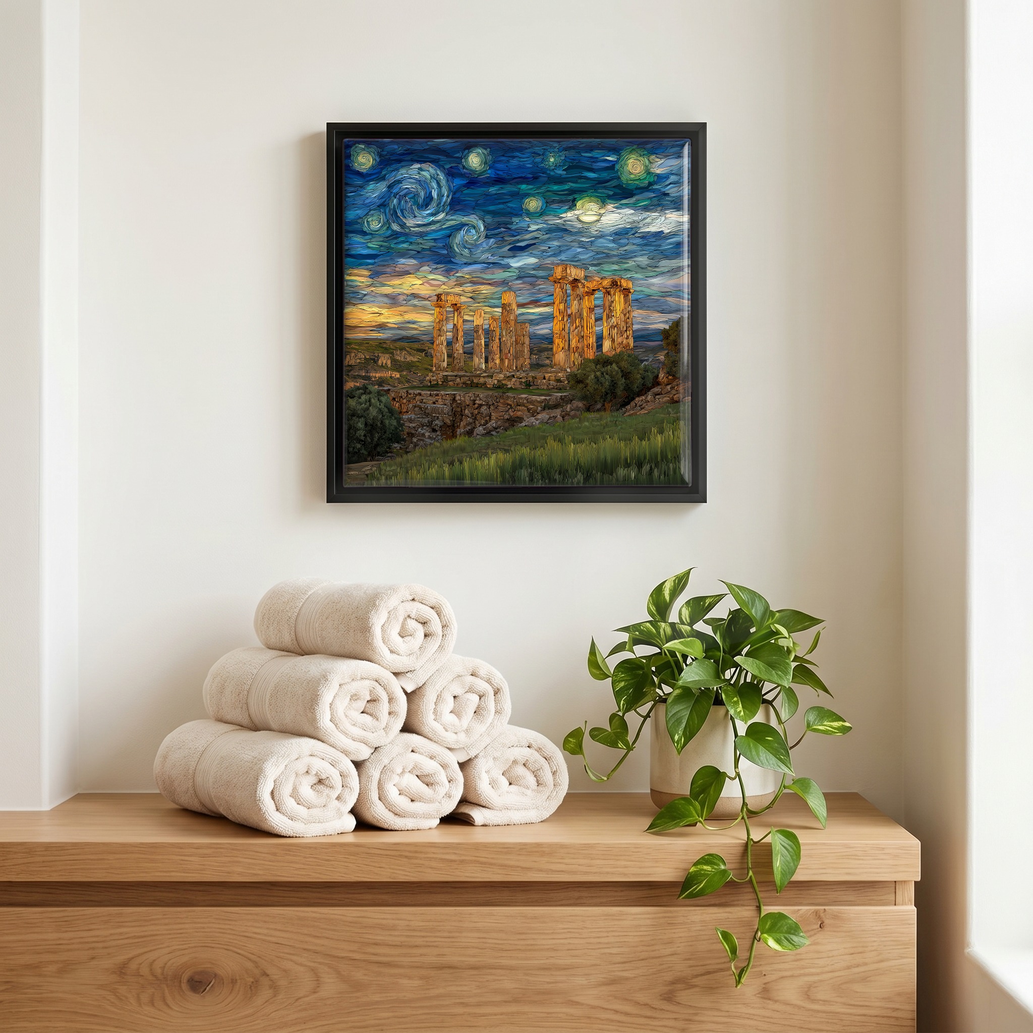 Above the linens, in a slim black surround.