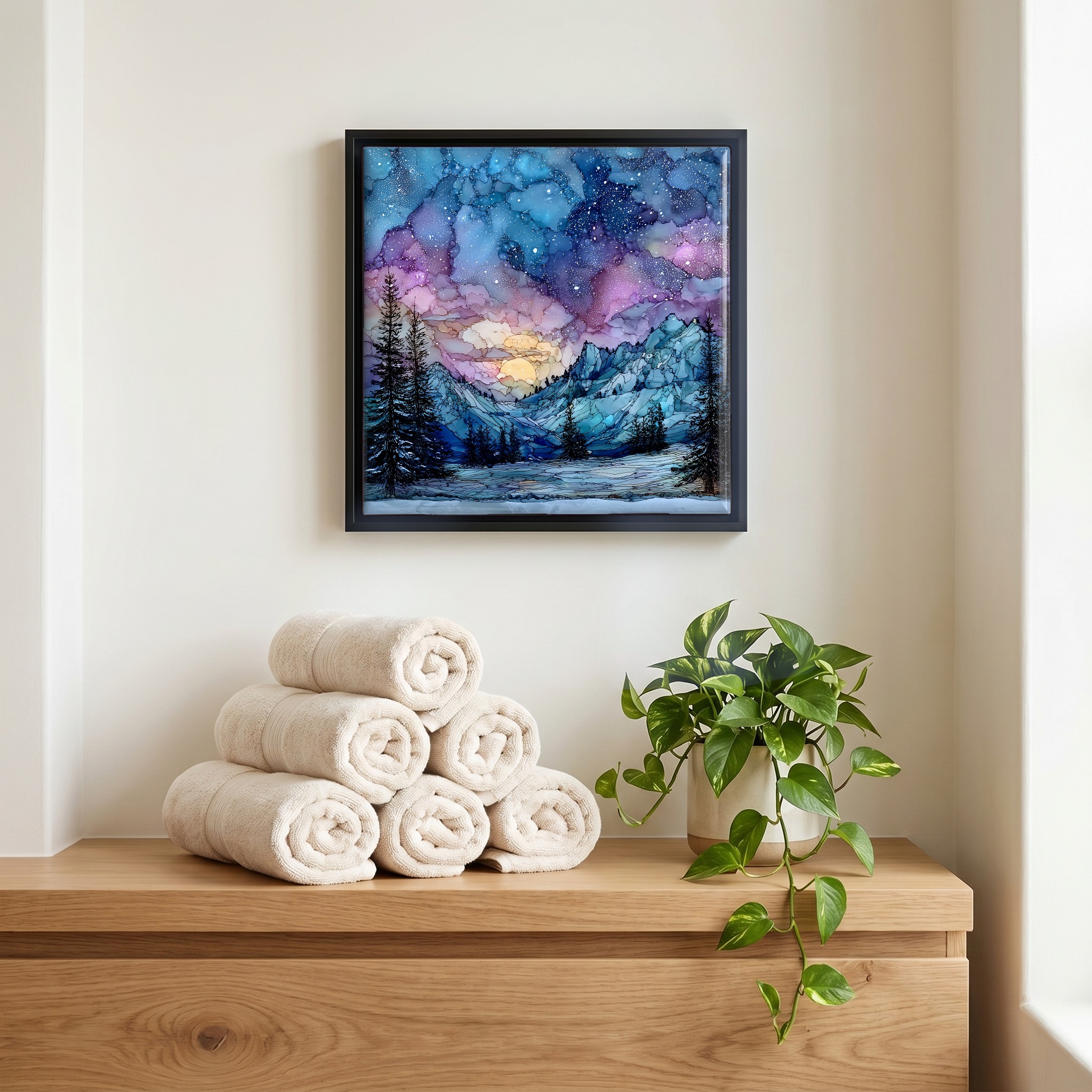 Above the linens, in a slim black surround.