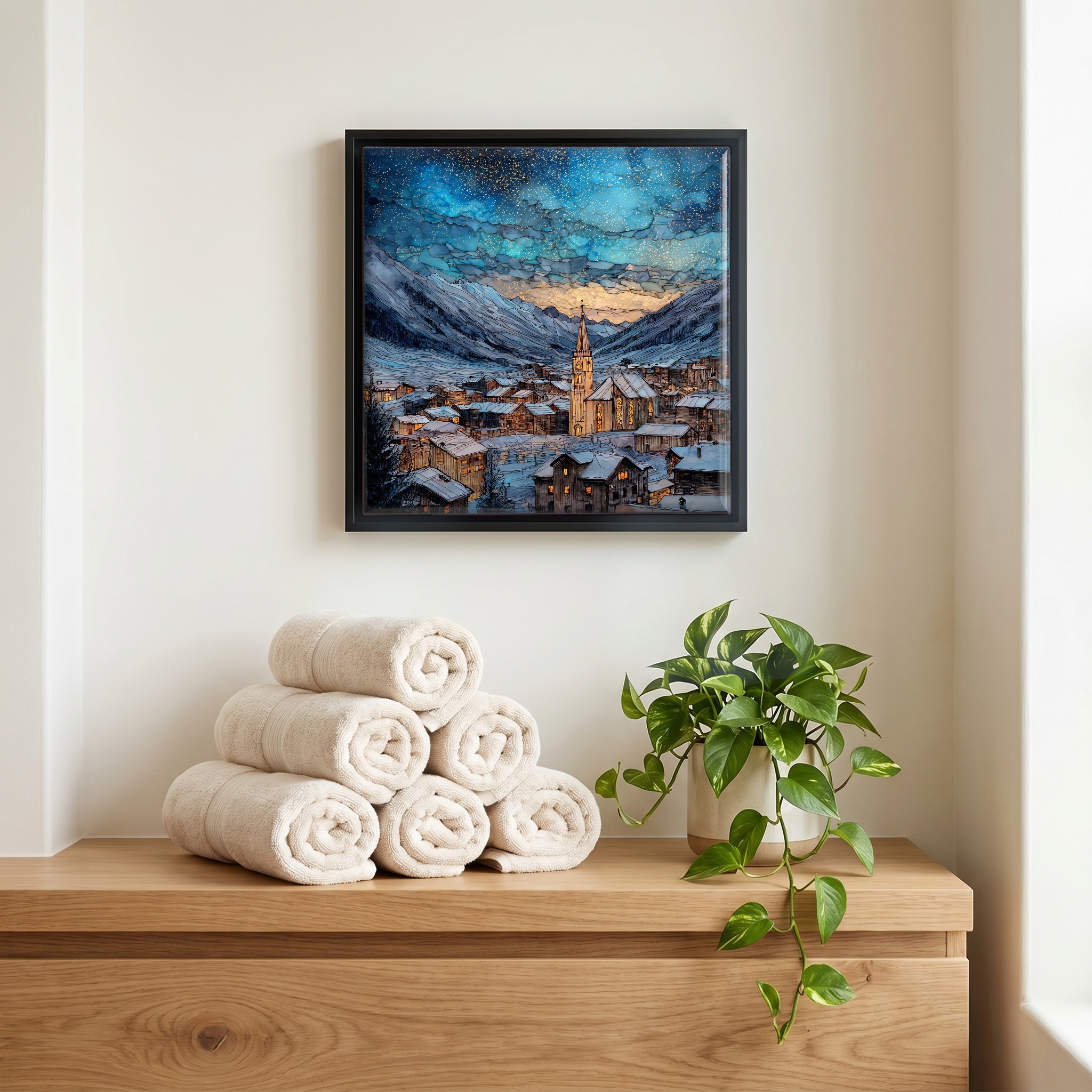 Above the linens, in a slim black surround.