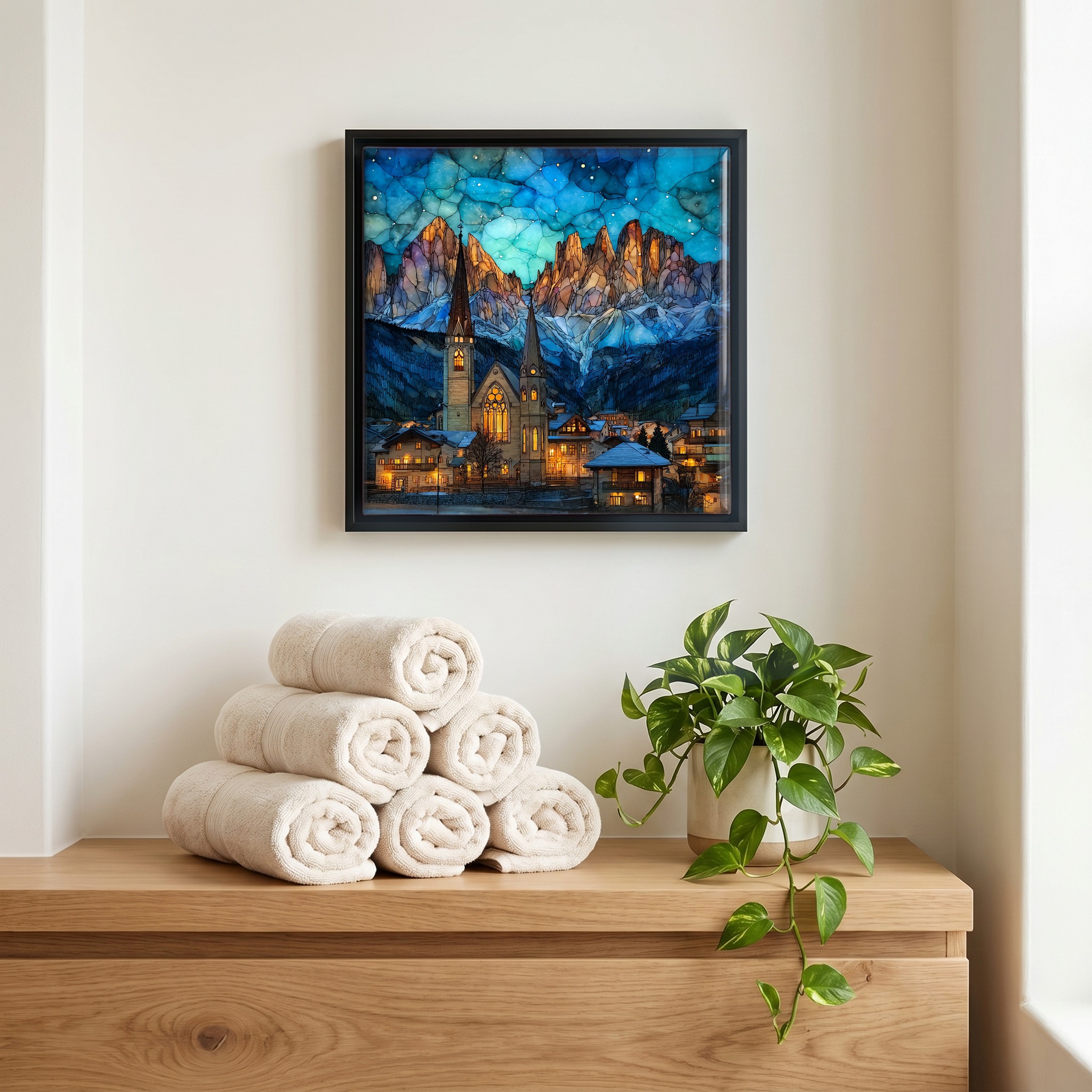 Above the linens, in a slim black surround.